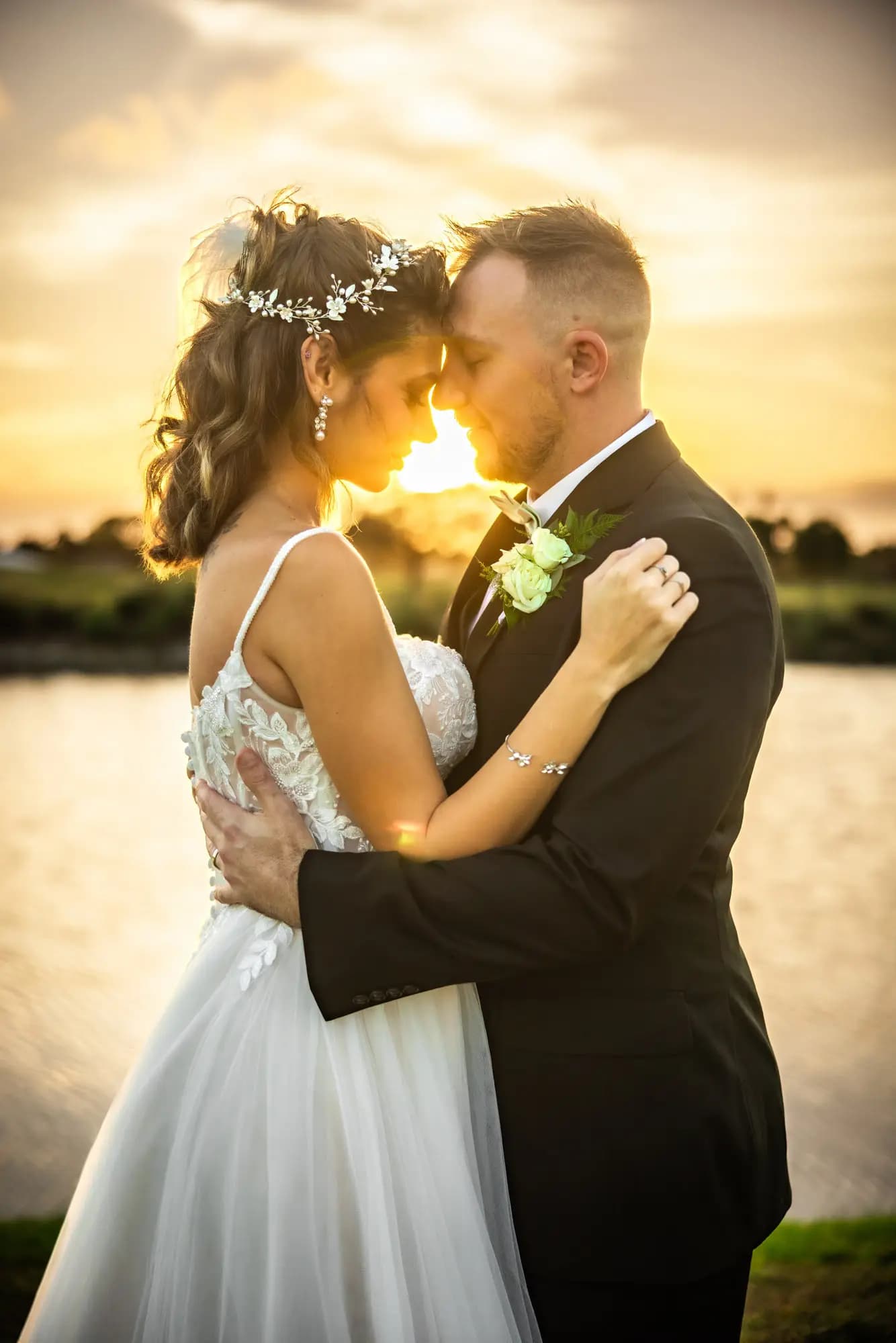 Sunset ceremony golden hour wedding at a South Florida waterfront venue by Boogietek Photo+Cinema