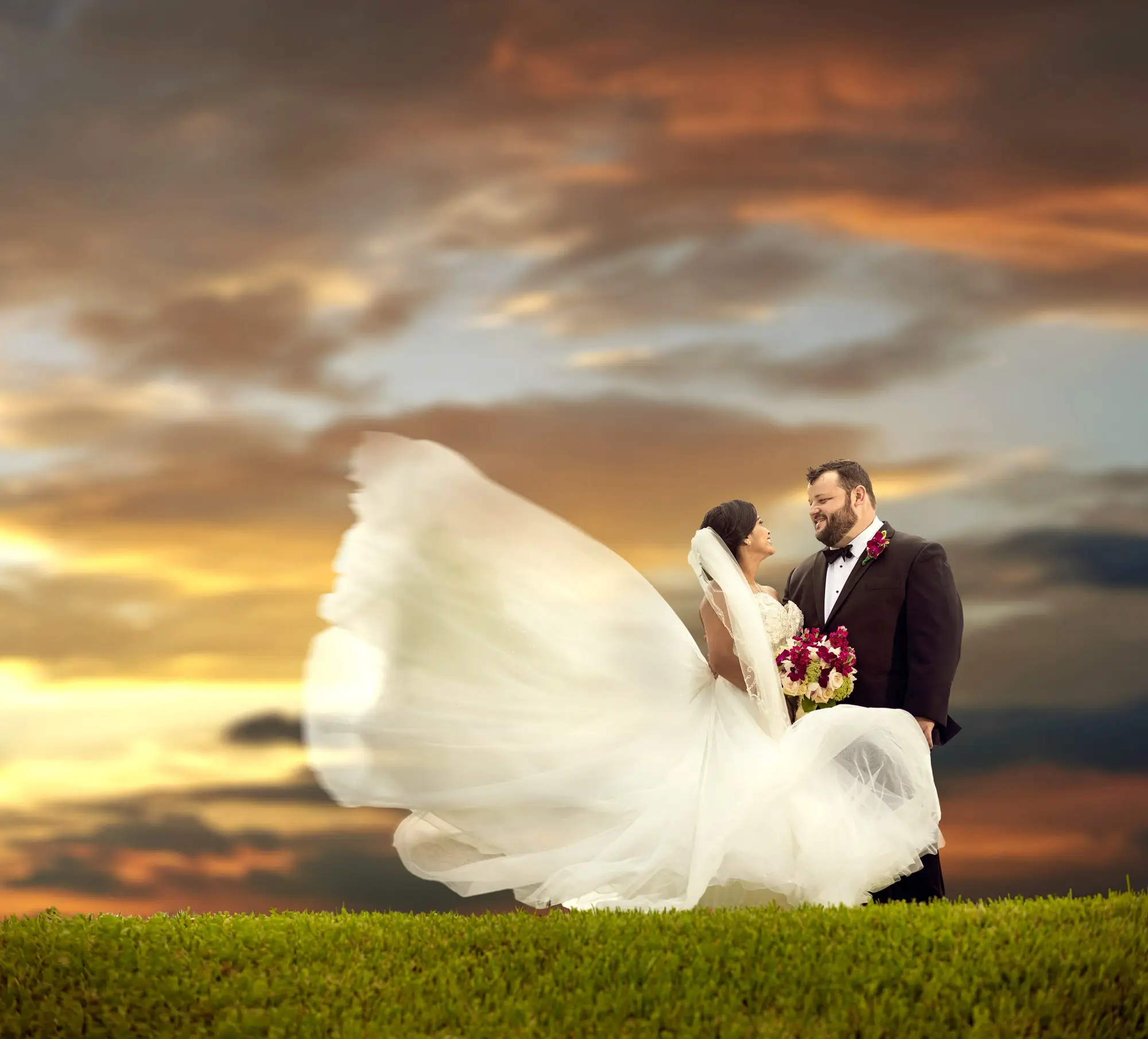 Golden hour light during a South Florida wedding ceremony captured by Boogietek Photo+Cinema