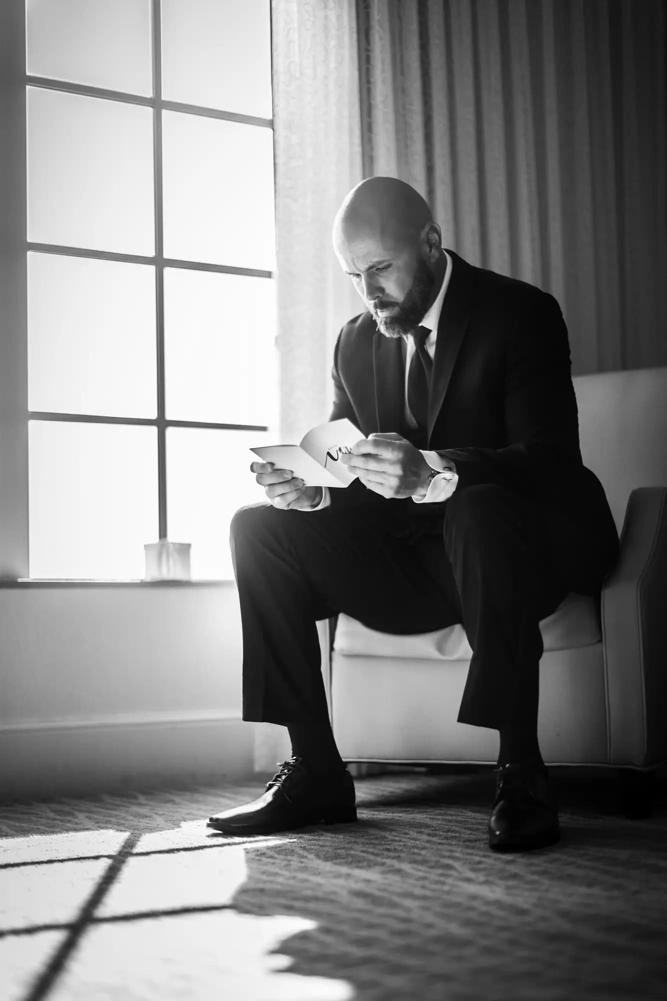 Classic black and white wedding photography — a quiet, interior moment at a South Florida wedding by Boogietek Photo+Cinema