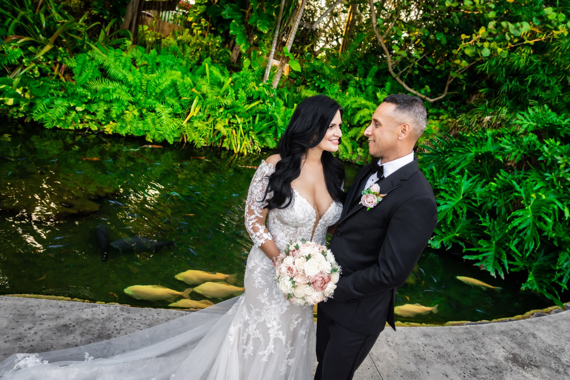 Sheri and Raul wedding portrait at Spur of the Moment Ranch tropical garden, Homestead Florida, captured by Boogietek Photo+Cinema