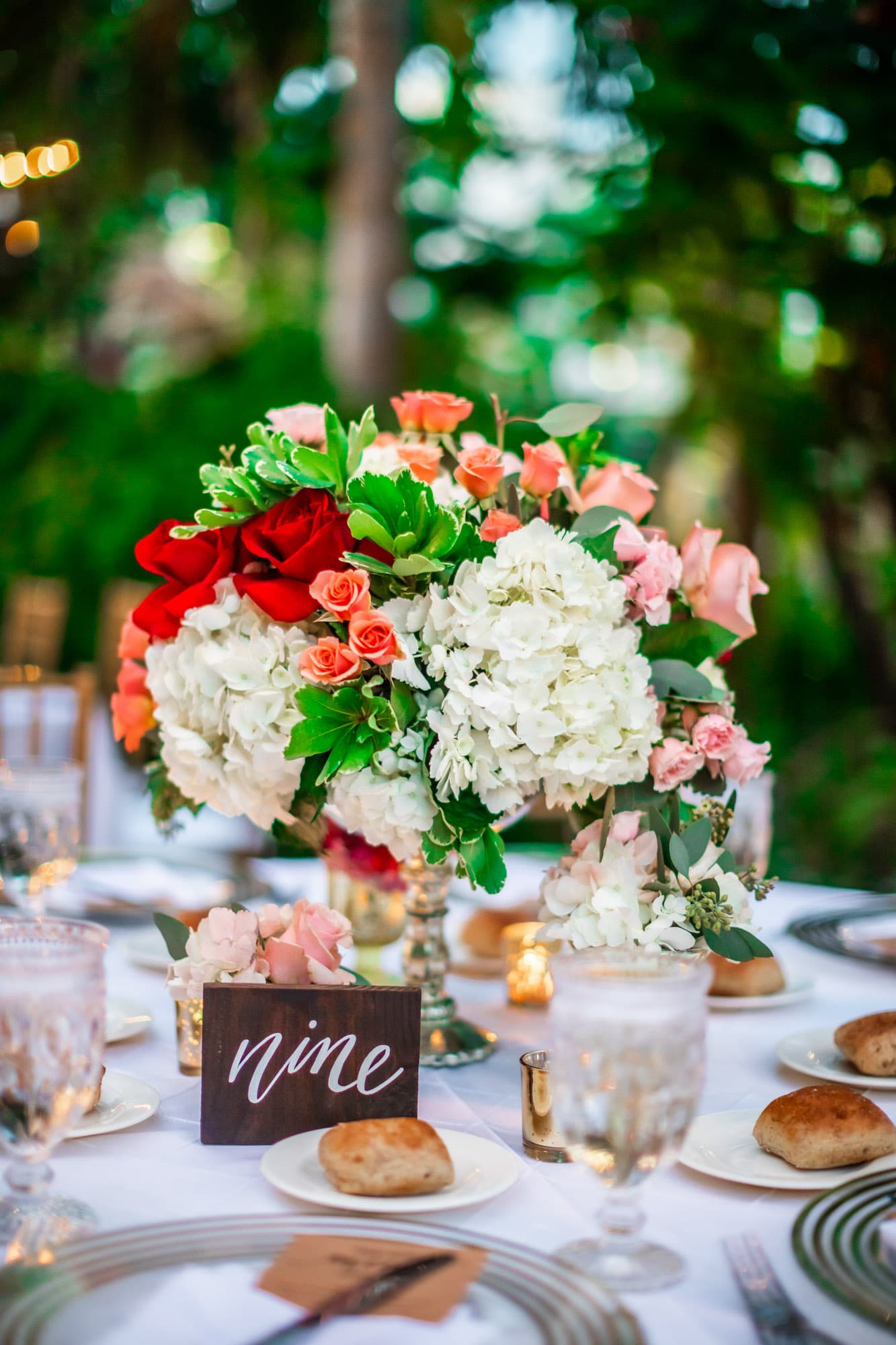 Barbara and Scott wedding at Miami Beach Botanical Garden couple with personalized wooden sign, South Florida wedding photography by Boogietek