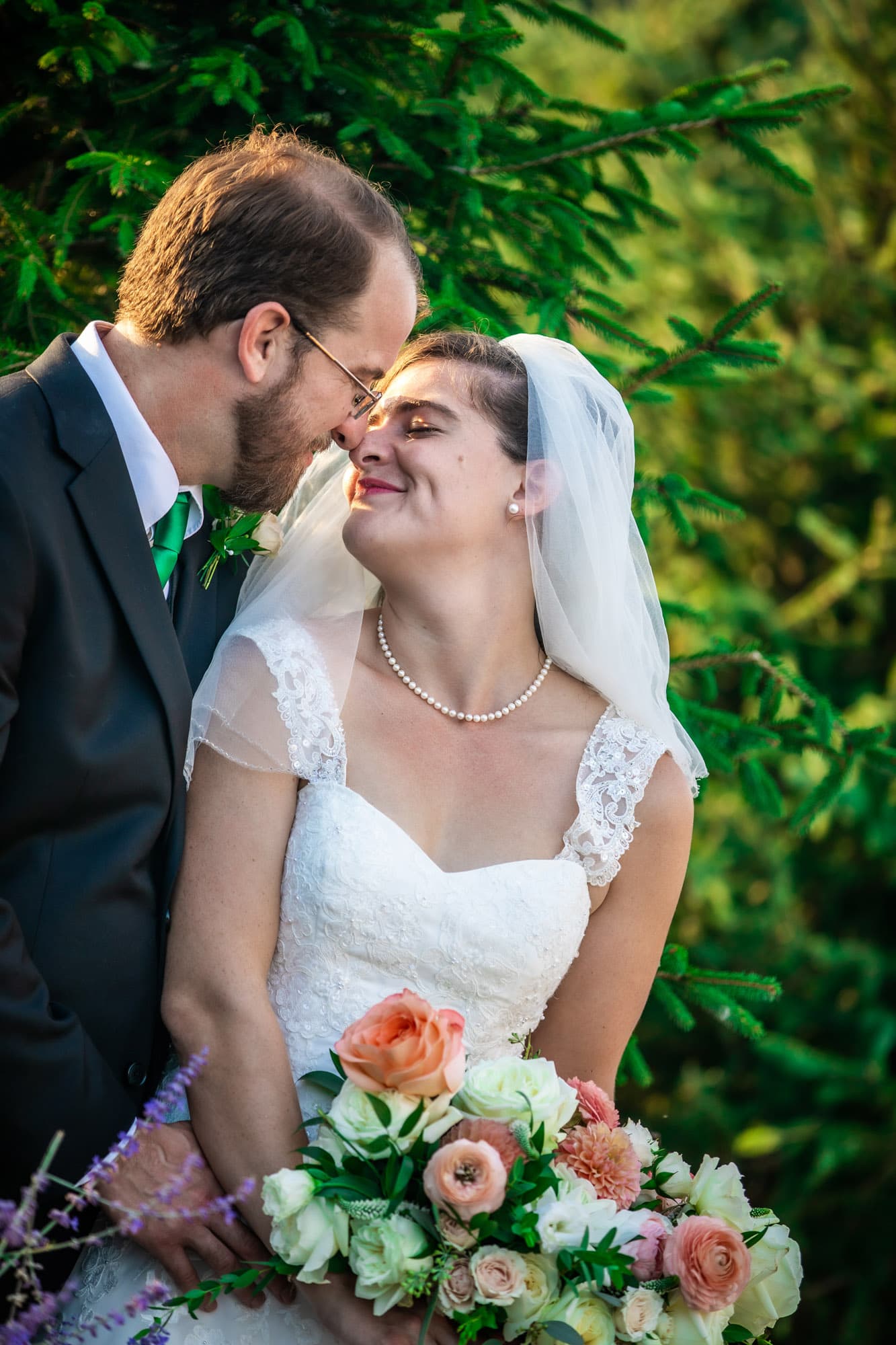 Romantic outdoor wedding at Elora Mill Hotel in Elora, Ontario, Canada with lush garden ceremony and intimate reception, captured by Boogietek Photo+Cinema